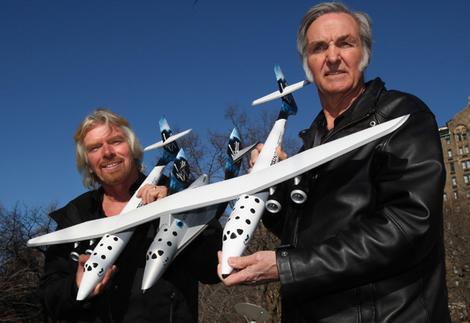 Sir Richard Branson (L), and Burt Rutan (R), CEO of Scaled Composites, with a model of WhiteKnightTwo